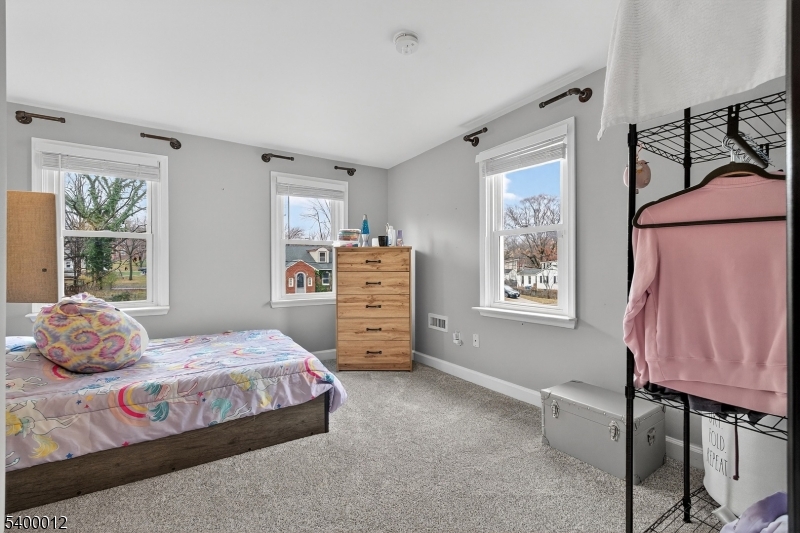 348 Broad Street Mount Holly, NJ 08060 - Photo 20 of 30 a bedroom with a bed and window