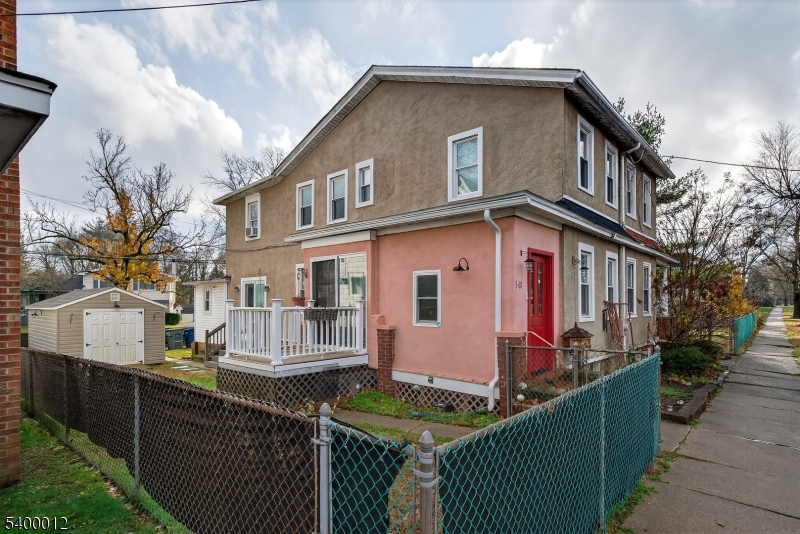 348 Broad Street Mount Holly, NJ 08060 - Photo 2 of 30 a front view of a house with balcony