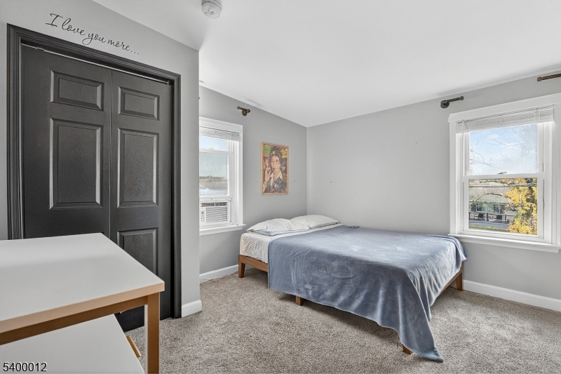 348 Broad Street Mount Holly, NJ 08060 - Photo 26 of 30 a bedroom with a bed and a window