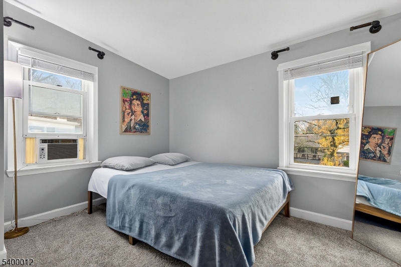 348 Broad Street Mount Holly, NJ 08060 - Photo 27 of 30 a bedroom with a bed and a window