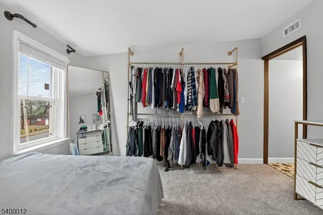 a view of a houses on the roof deck