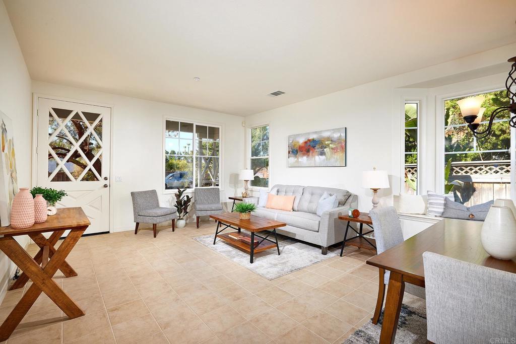 293 Star Jasmine Lane Encinitas, CA 92024 - Photo 14 of 37 a living room with furniture and a large window
