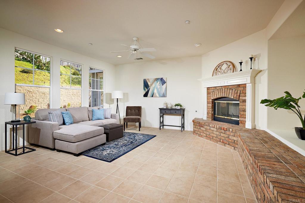 293 Star Jasmine Lane Encinitas, CA 92024 - Photo 21 of 37 a living room with furniture and a fireplace