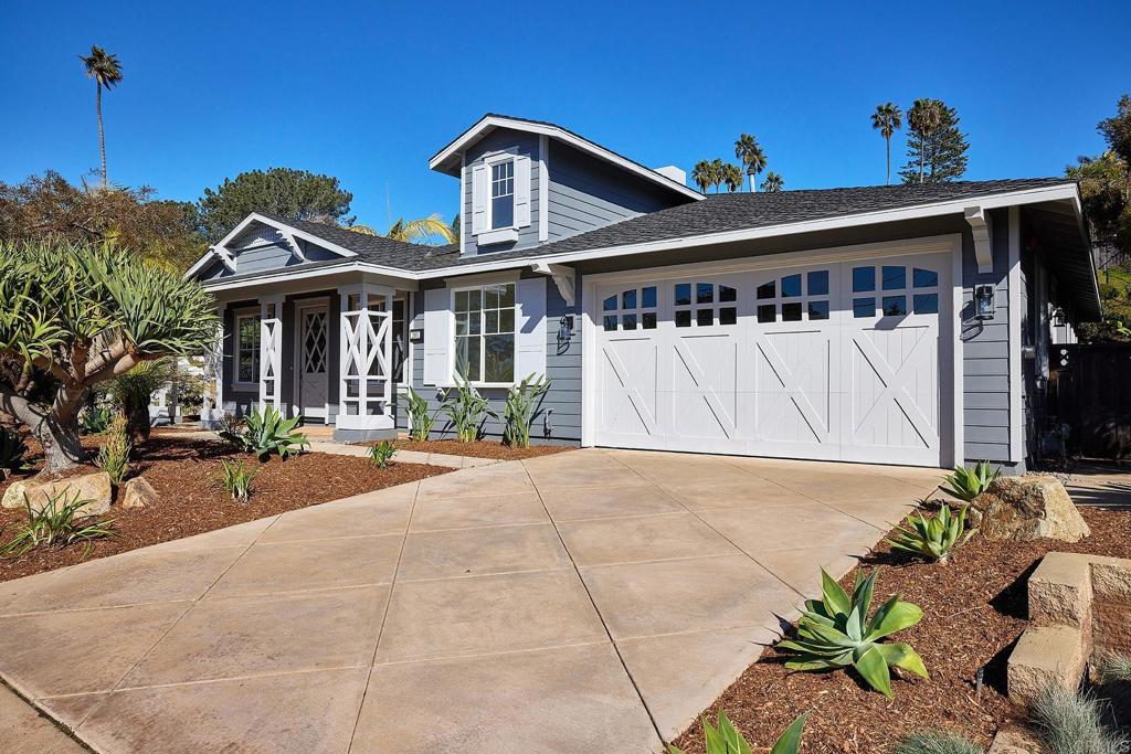293 Star Jasmine Lane Encinitas, CA 92024 - Photo 36 of 37 a front view of a house with a yard