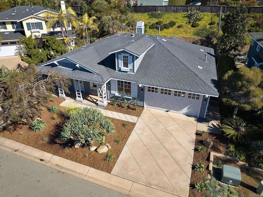 293 Star Jasmine Lane Encinitas, CA 92024 - Photo 8 of 37 an aerial view of a house with a yard and potted plants