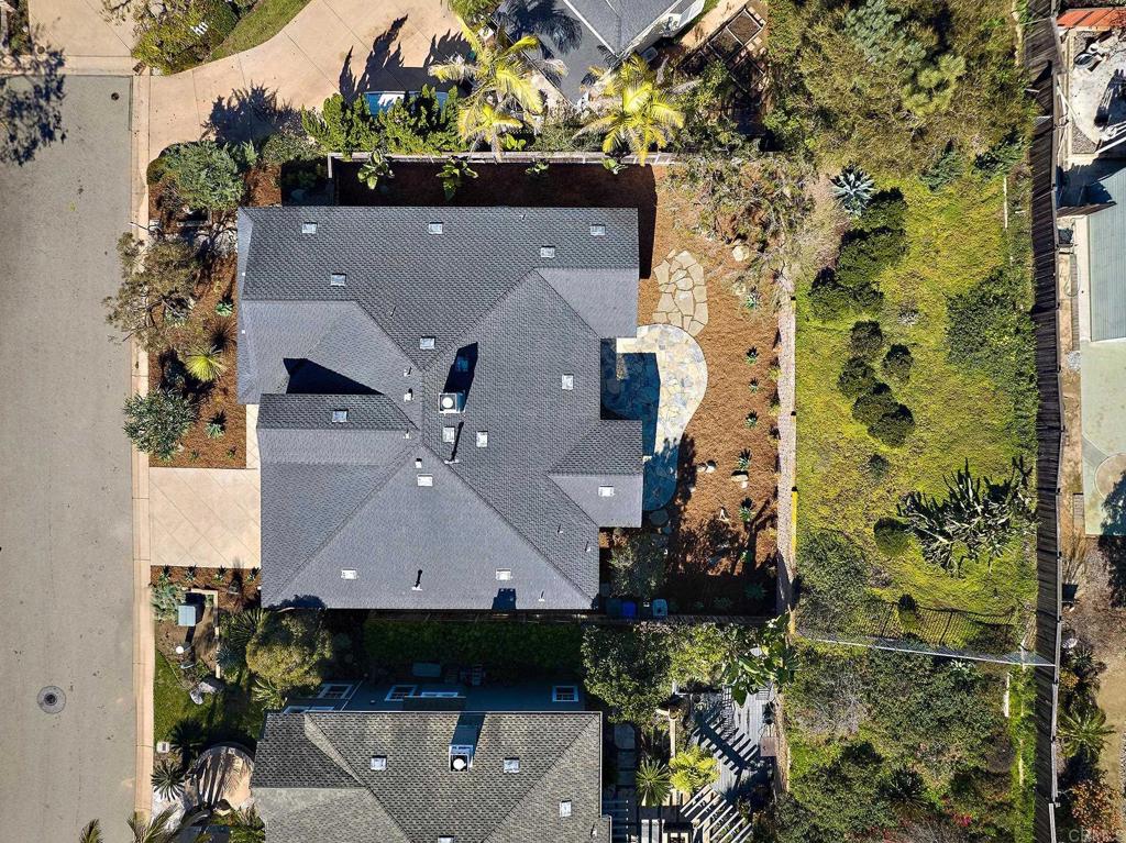 293 Star Jasmine Lane Encinitas, CA 92024 - Photo 10 of 37 an aerial view of a house with a yard and potted plants