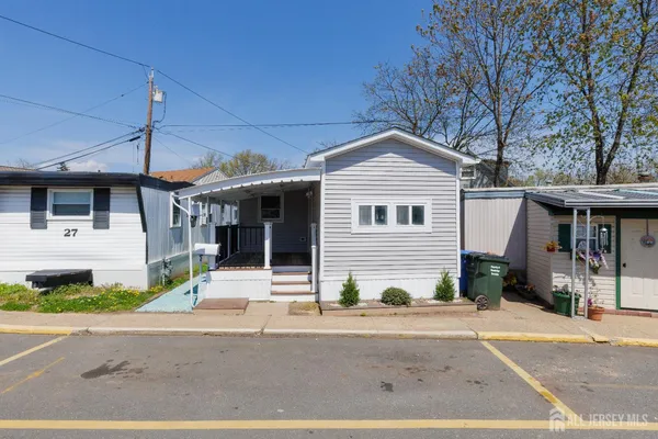 a front view of a house with garage