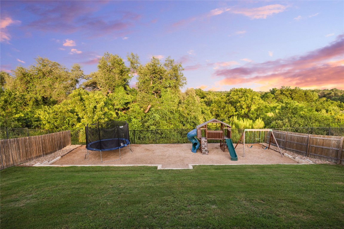 a view of a garden with a bench