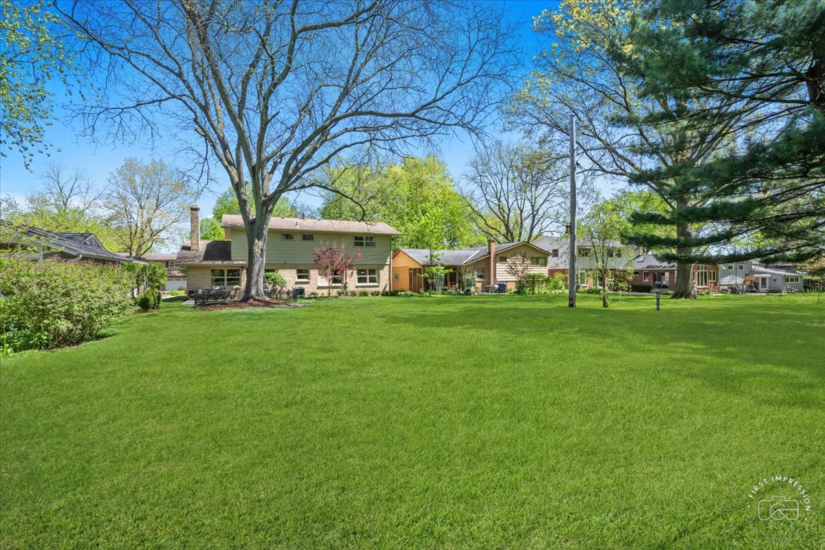 1508 Dunstan Road Geneva, IL 60134 - Photo 25 of 30 a view of a house with a big yard