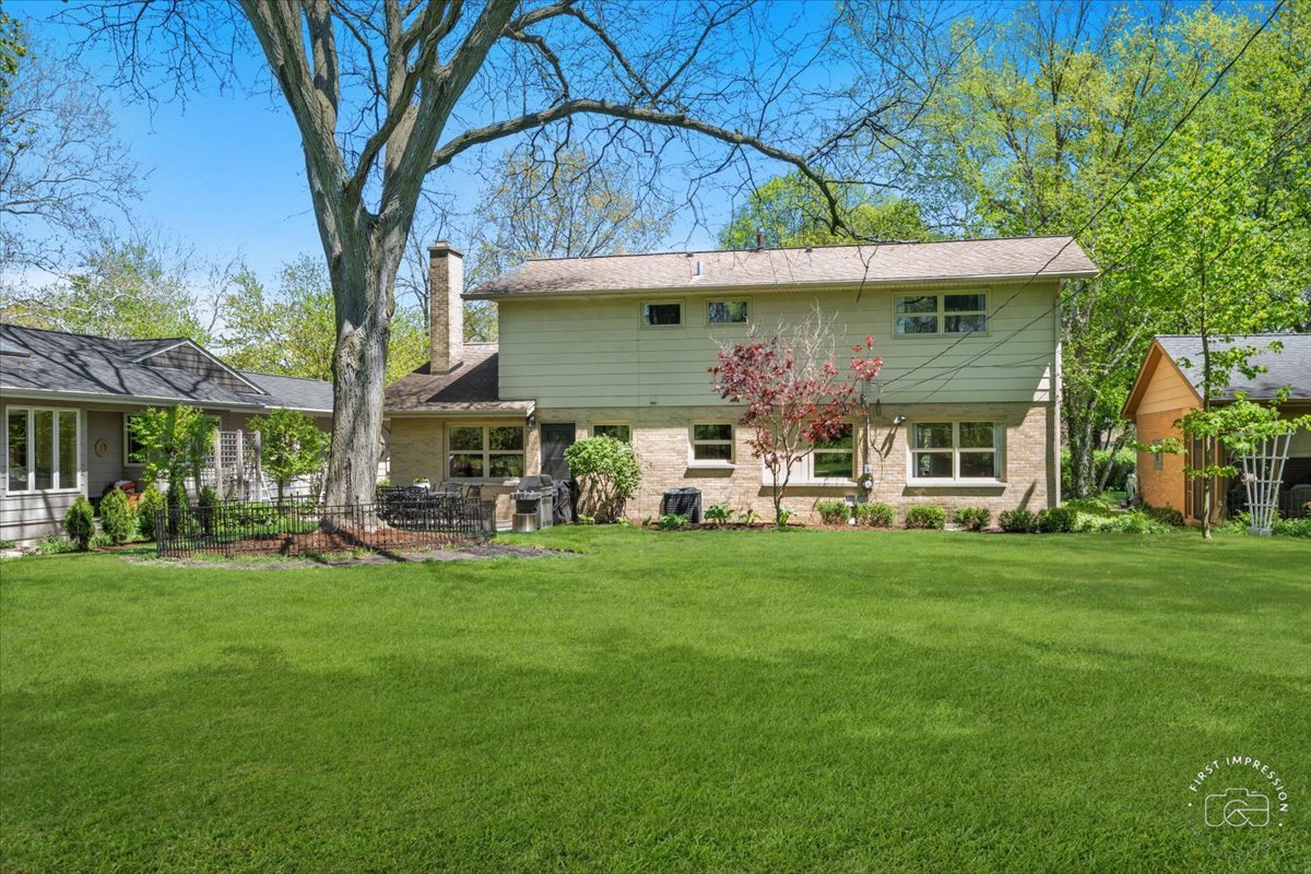 1508 Dunstan Road Geneva, IL 60134 - Photo 27 of 30 a view of a house with a backyard