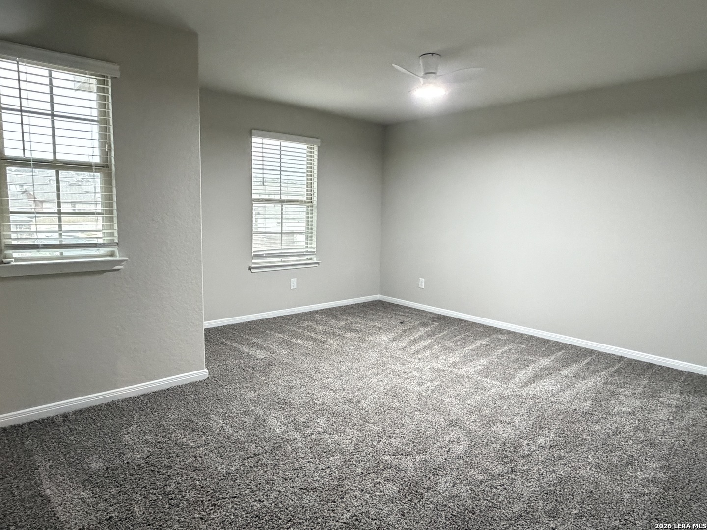 6814 Shiraz Way Converse, TX 78109 - Photo 12 of 16 an empty room with a window