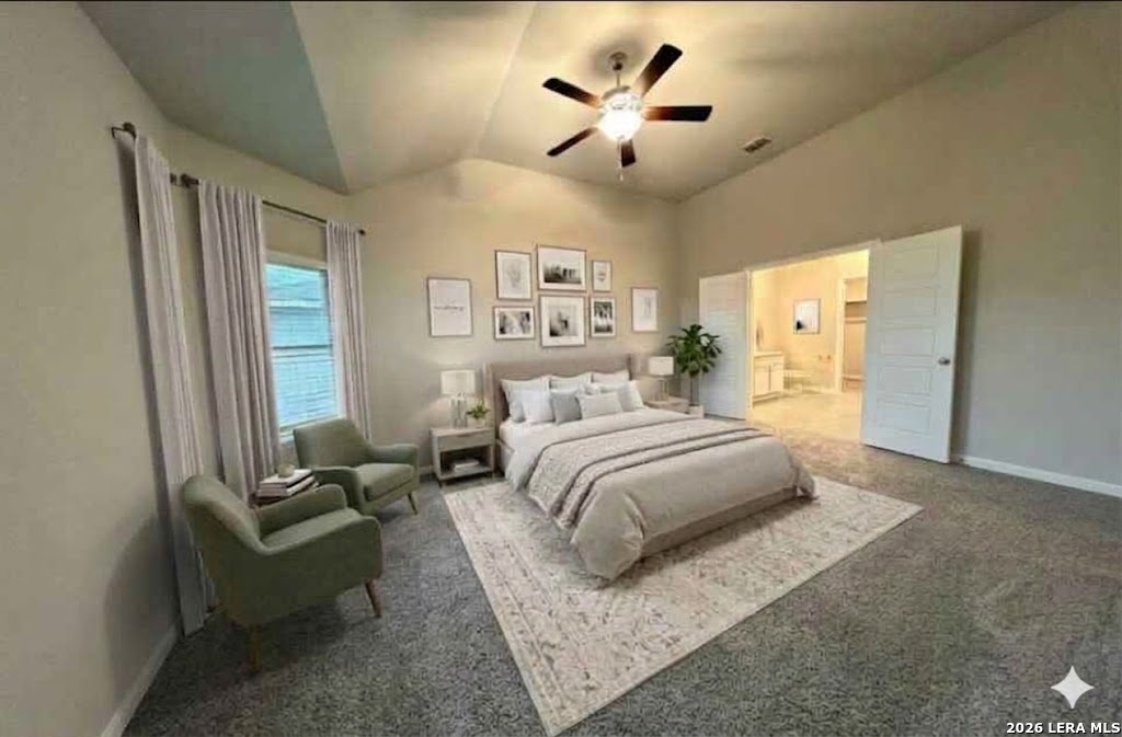 6814 Shiraz Way Converse, TX 78109 - Photo 5 of 16 a spacious bedroom with a bed couch and a window