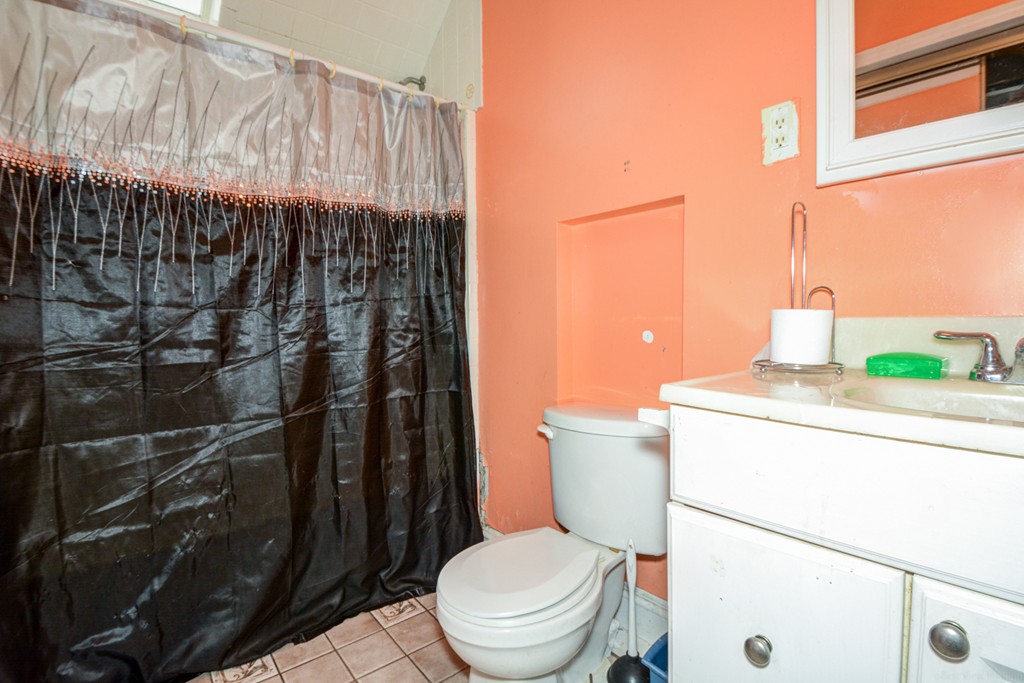 31 Ripley Street Worcester, MA 01610 - Photo 9 of 16 a bathroom with a toilet and a shower