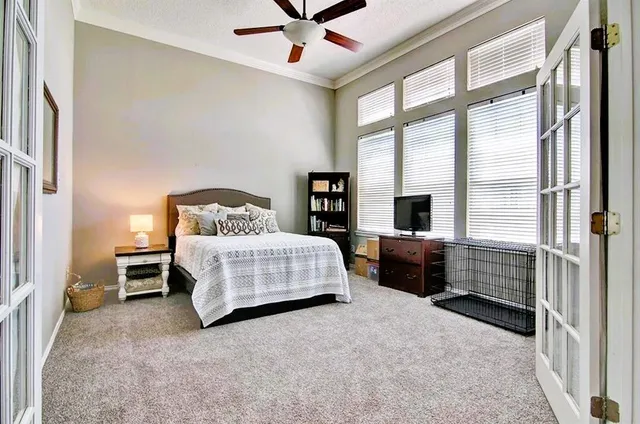 a bathroom with a sink and mirror with toilet