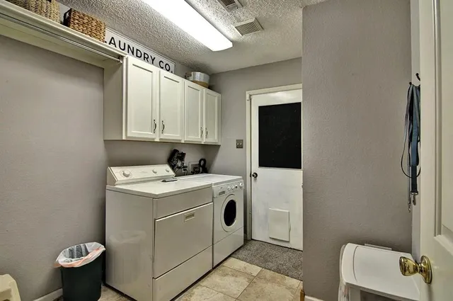 a bedroom with a bed and ceiling fan