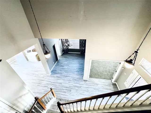 a view of entryway and kitchen