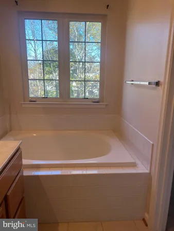 a bathroom with a shower and toilet