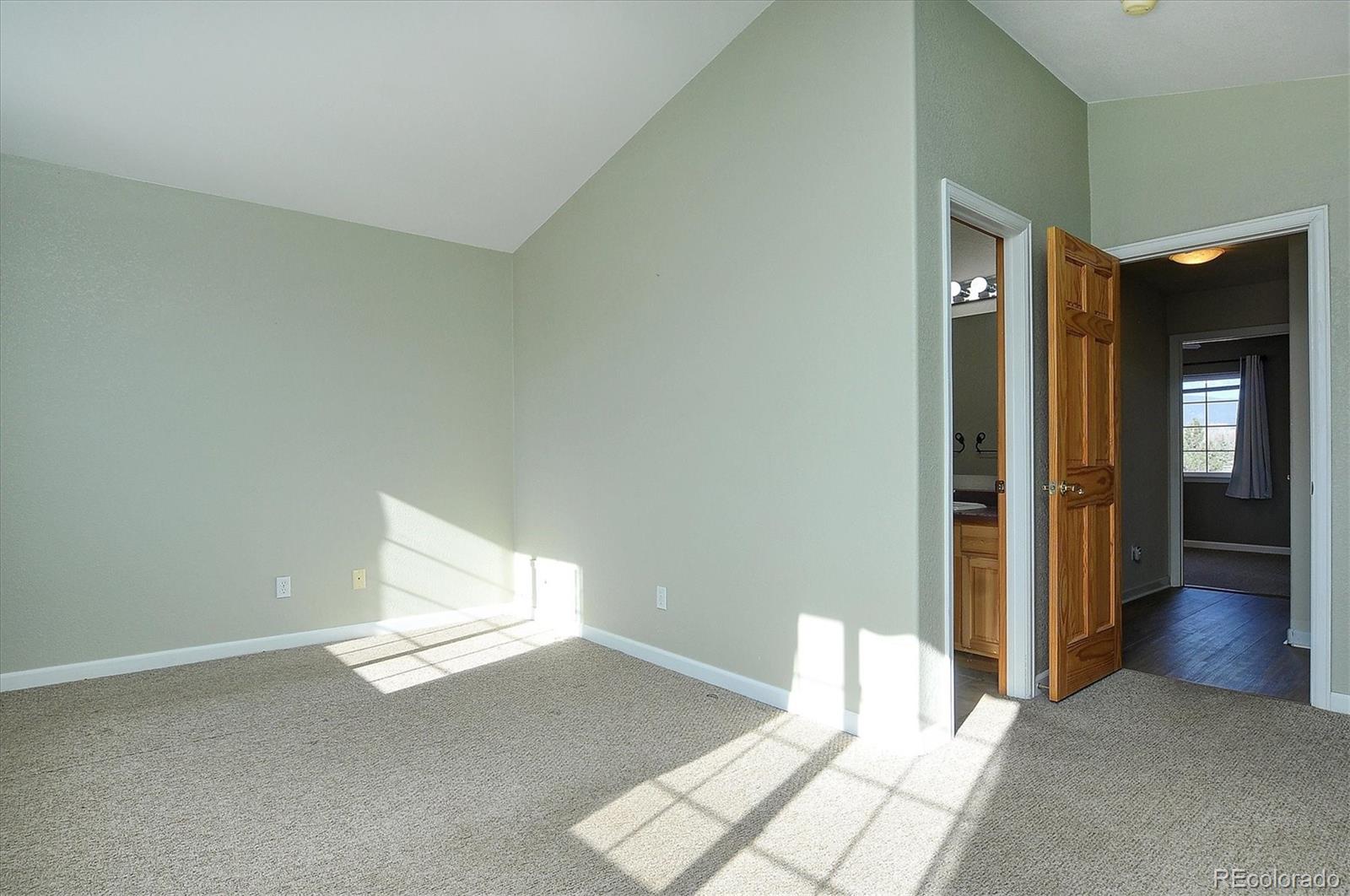 160 Windwalker Road Buena Vista, CO 81211 - Photo 30 of 47 a view of a room with wooden floor and windows