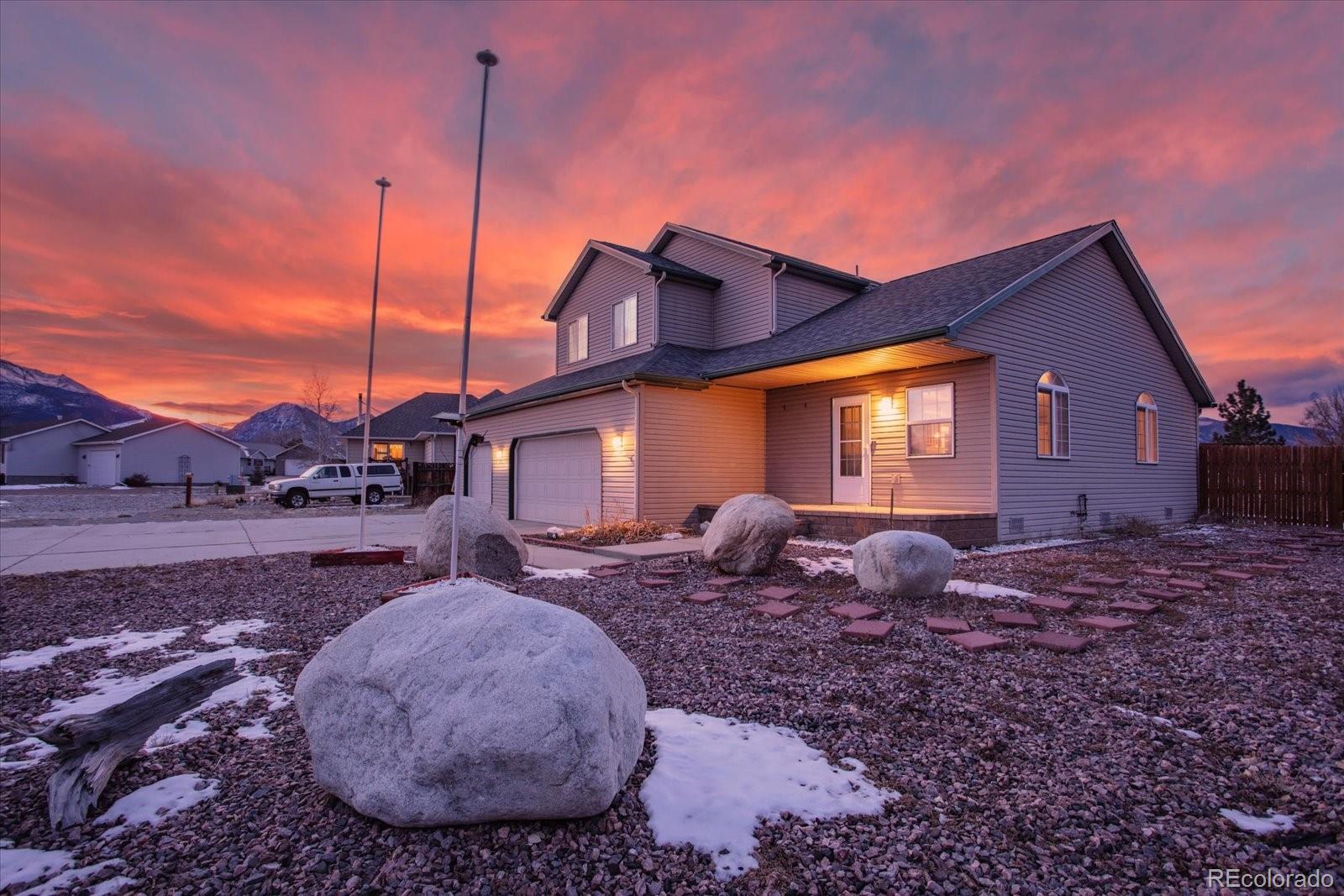 160 Windwalker Road Buena Vista, CO 81211 - Photo 3 of 47 a view of a house with backyard and a tree