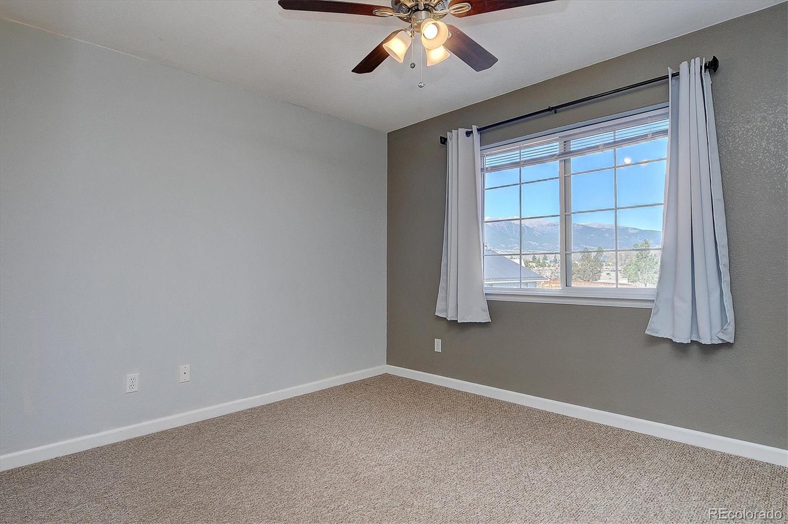 160 Windwalker Road Buena Vista, CO 81211 - Photo 34 of 47 a view of an empty room with a window