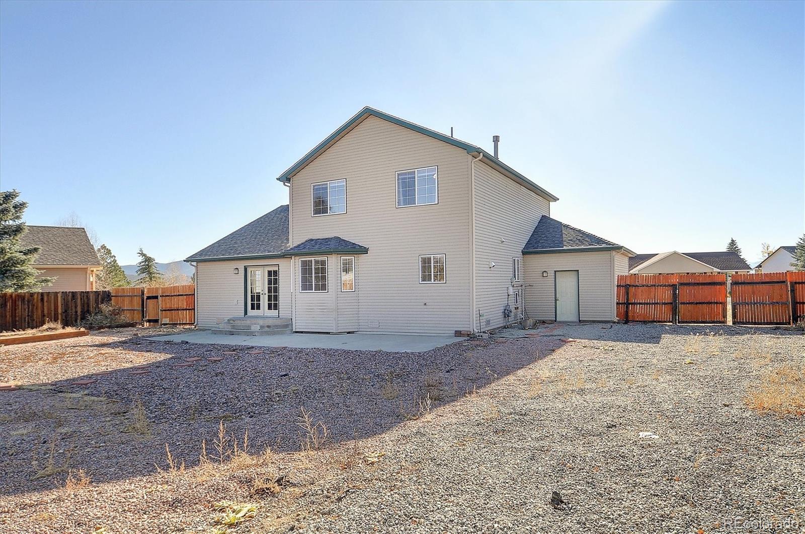 160 Windwalker Road Buena Vista, CO 81211 - Photo 47 of 47 a view of a yard in front of a house with wooden fence