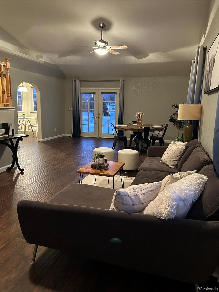 160 Windwalker Road Buena Vista, CO 81211 - Photo 9 of 47 a living room with furniture and a chandelier