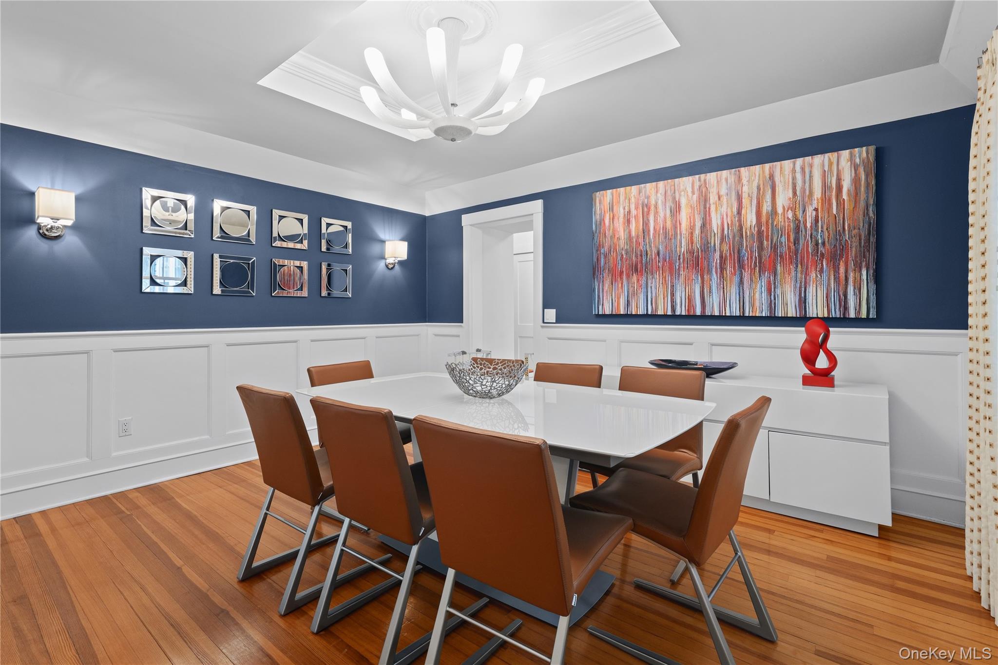 131 Douglas Road Chappaqua, NY 10514 - Photo 5 of 26 a view of a dining room with furniture and chandelier