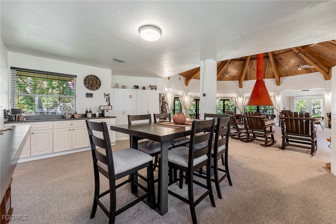 1400 Catamount Road LaBelle, FL 33935 - Photo 20 of 50 a dining hall with furniture a window and kitchen view