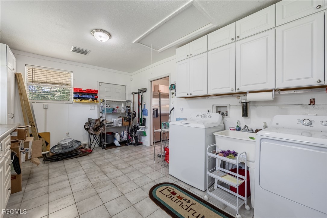 1400 Catamount Road LaBelle, FL 33935 - Photo 32 of 50 a room with storage and utility