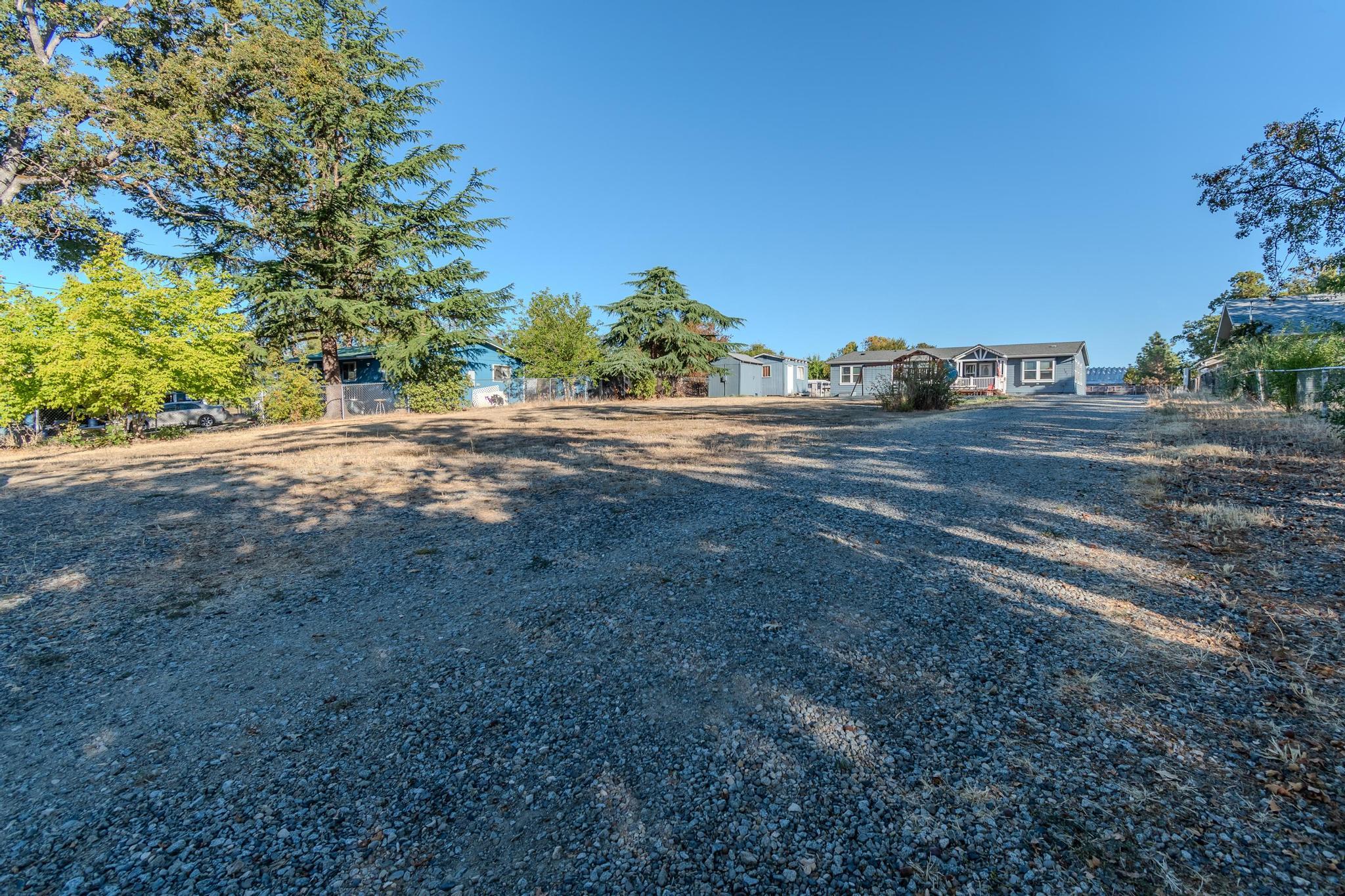 187 East Gregory Road Central Point, OR 97502 - Photo 29 of 29 a view of a yard with a tree