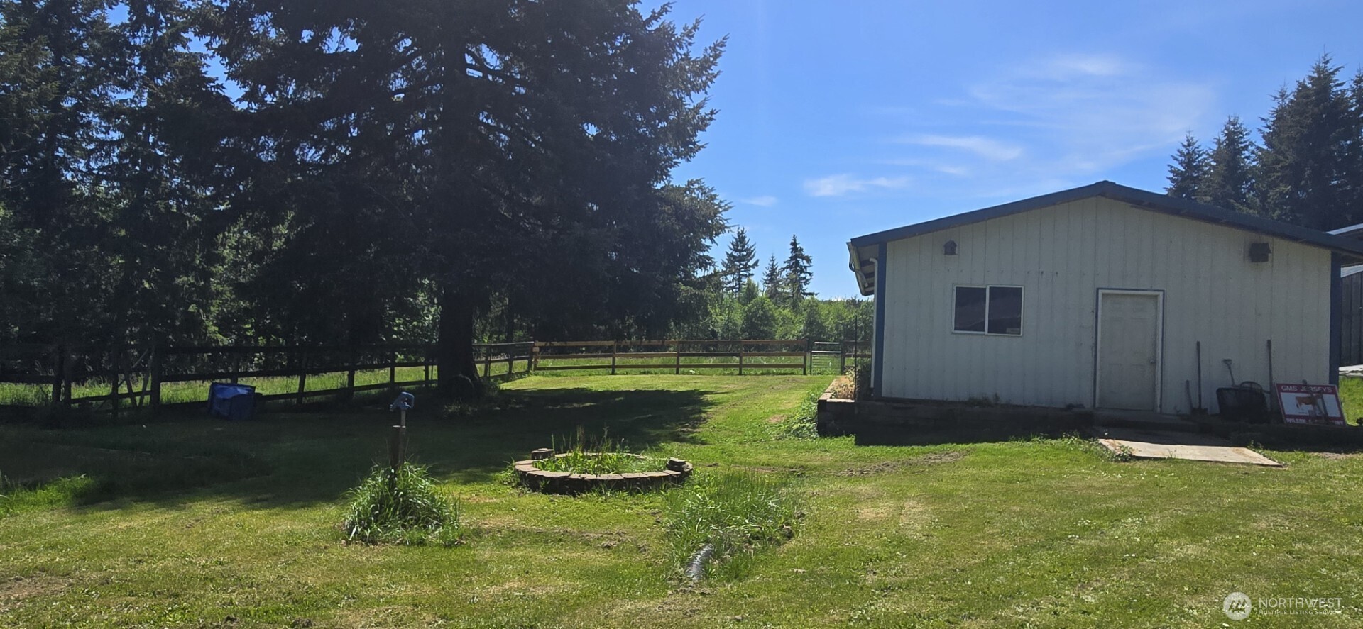 123 Barton Road Rochester, WA 98579 - Photo 4 of 25 a view of a house with a yard