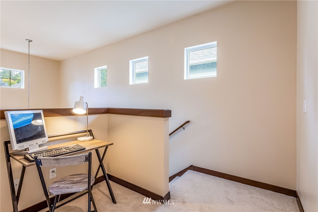 413 203rd Place Southeast Bothell, WA 98012 - Photo 23 of 38 a view of workspace with wooden floor