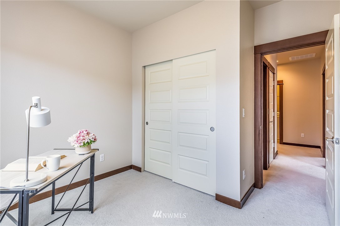 413 203rd Place Southeast Bothell, WA 98012 - Photo 33 of 38 a view of an entryway with table and a hallway