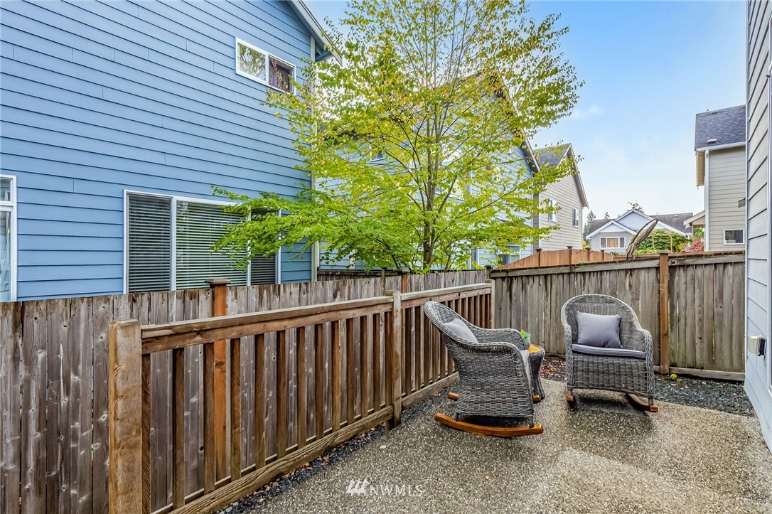 413 203rd Place Southeast Bothell, WA 98012 - Photo 36 of 38 a view of a wooden deck and a backyard