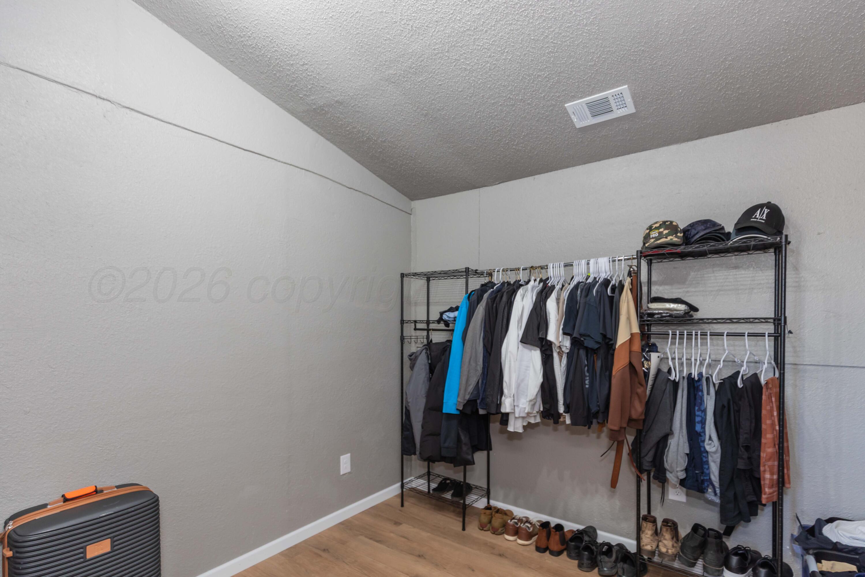 14175 Shenandoah Road Amarillo, TX 79118 - Photo 19 of 35 PRIMARY CLOSET VIEW 1 (2)