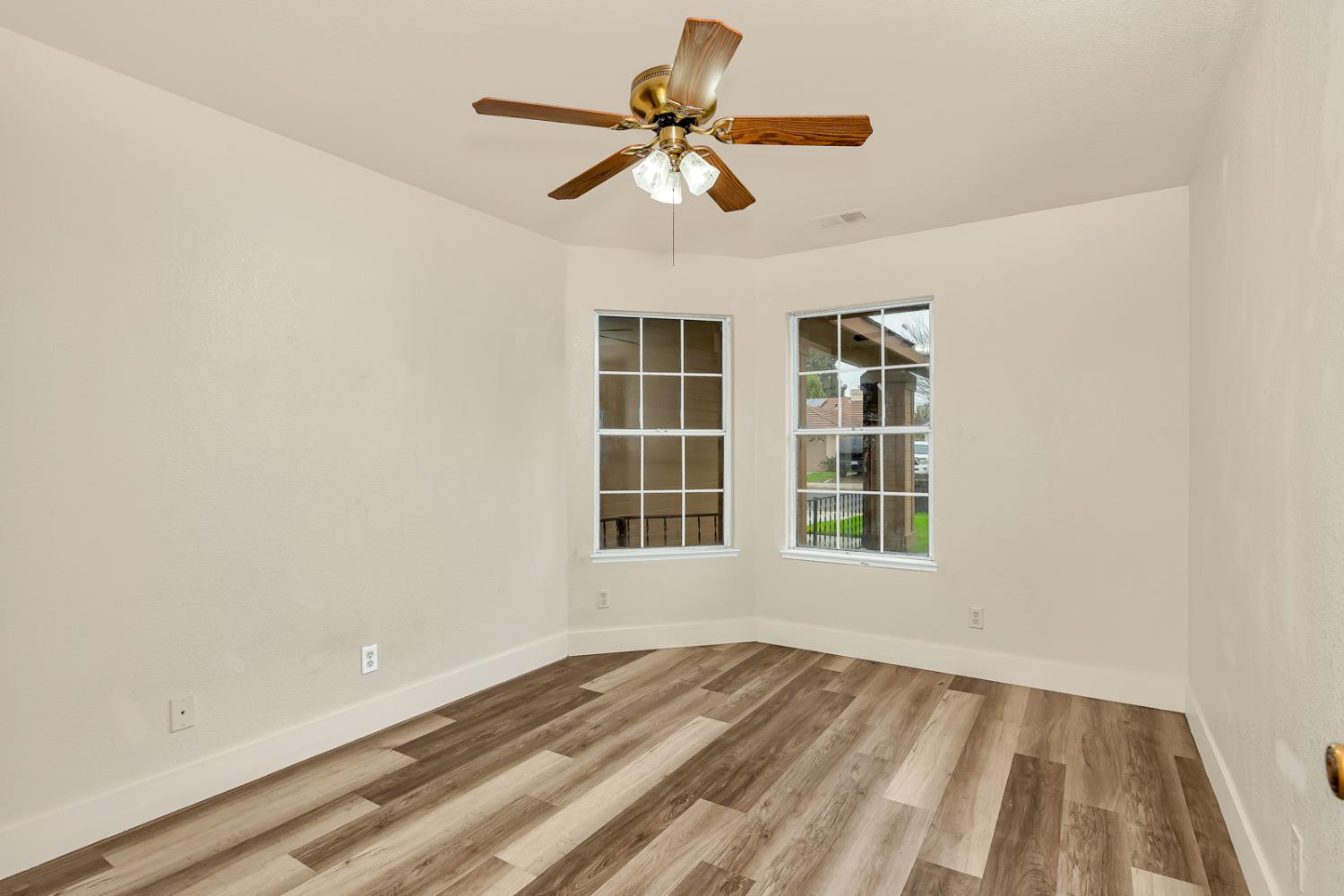 2408 Beatrice Lane Modesto, CA 95355 - Photo 15 of 36 a view of an empty room with a window