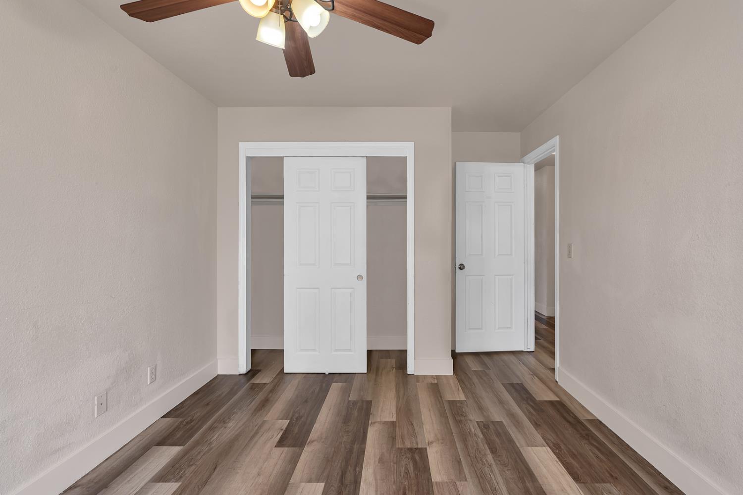 2408 Beatrice Lane Modesto, CA 95355 - Photo 18 of 36 wooden floor in an empty room