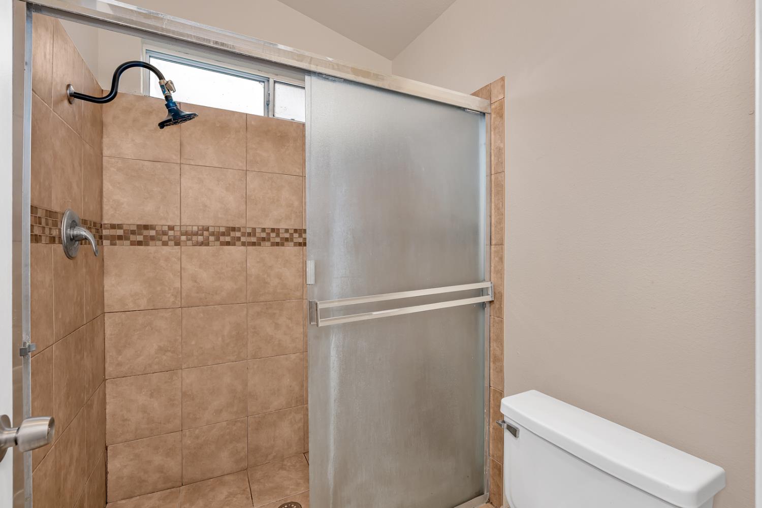 2408 Beatrice Lane Modesto, CA 95355 - Photo 27 of 36 a bathroom with a shower