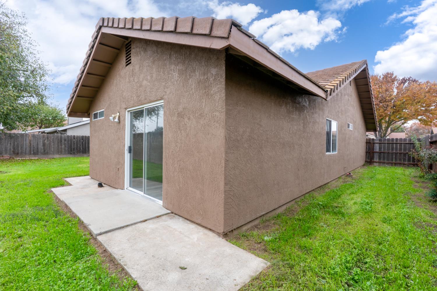 2408 Beatrice Lane Modesto, CA 95355 - Photo 28 of 36 a front view of a house with garden