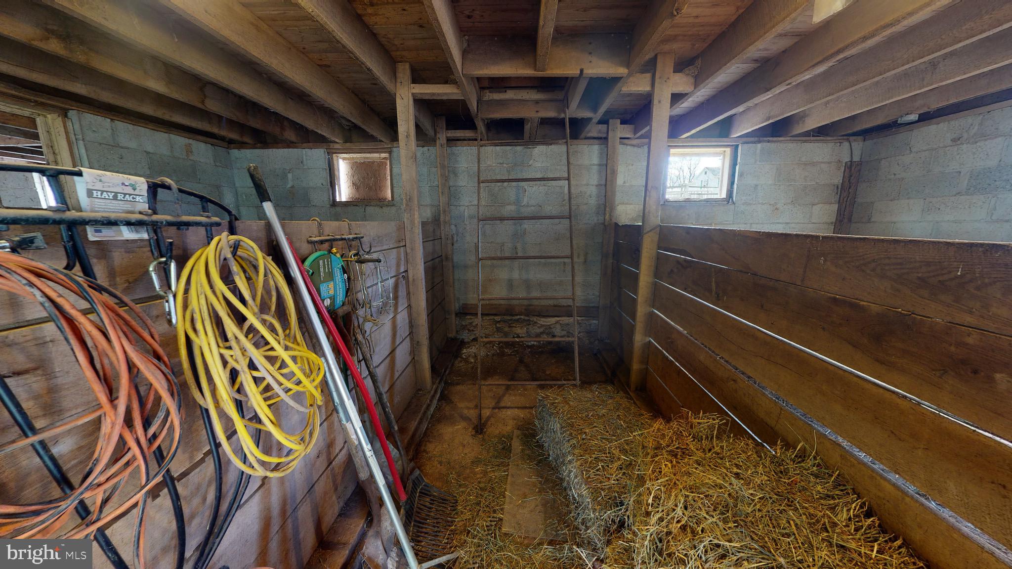 4609 Wards Chapel Road Owings Mills, MD 21117 - Photo 51 of 64 Tack room/Feed room with access to hay loft
