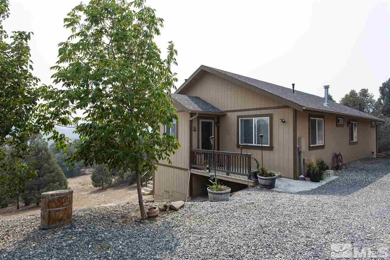 1931 Morgan Road Reno, NV 89521 - Photo 1 of 40 a view of house with backyard space and sitting area