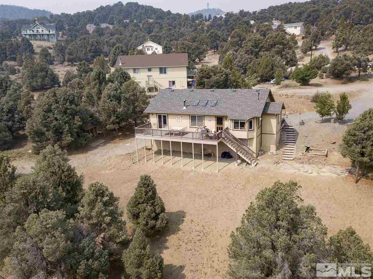 1931 Morgan Road Reno, NV 89521 - Photo 33 of 40 an aerial view of residential houses with outdoor space and trees