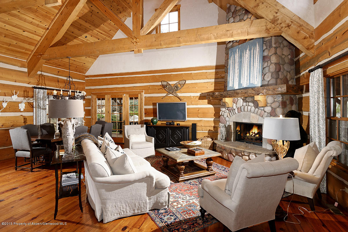 45 Altamira Ranch Road Basalt, CO 81621 - Photo 3 of 29 a outdoor living space with patio furniture and a fireplace
