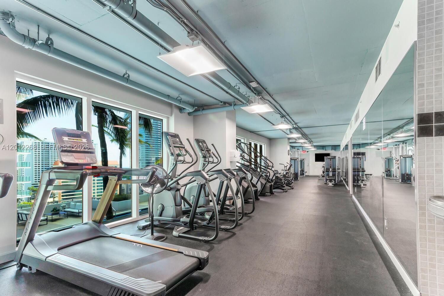 60 Southwest 13th Street, Unit 4005 Miami, FL 33130 - Photo 26 of 27 a view of a room with gym equipment