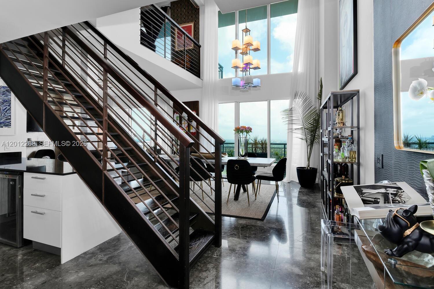 60 Southwest 13th Street, Unit 4005 Miami, FL 33130 - Photo 3 of 27 a view of an entryway and workspace