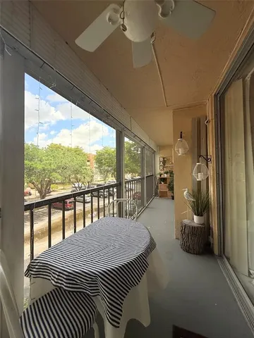a view of workspace with furniture and natural light