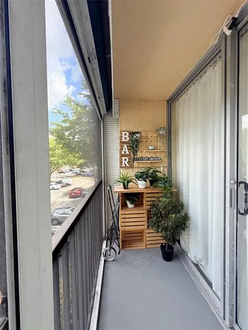 a view of a building with a yard