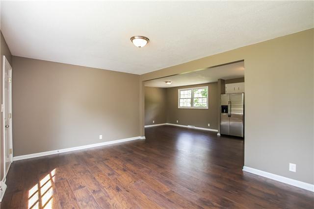 613 Paddy Run Road Clarksville, TN 37042 - Photo 11 of 20 Charming living room with beautiful new floors providing a welcoming entrance