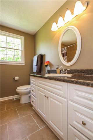 613 Paddy Run Road Clarksville, TN 37042 - Photo 5 of 20 Amazing bathroom with updated features ready to provide the greatest relaxation. All new fixtures and tile tub surround.