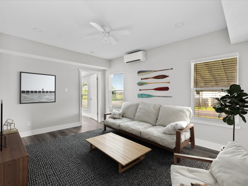 246 18th Street San Leon, TX 77539 - Photo 11 of 20 a living room with furniture and a large window